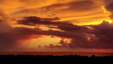 Dramatic sunset Sky with Clouds. City and Coastline Silhouette. Stock Footage 221652297