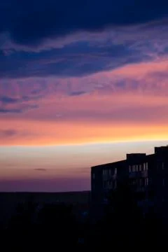 Dramatic sunset sky with clouds Stock Photos