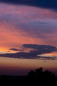 Dramatic sunset sky with clouds Stock Photos