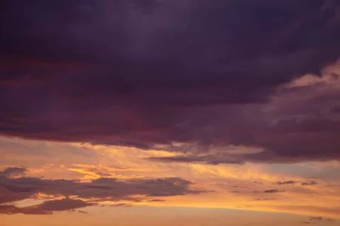 Dramatic sunset sky with clouds Stock Photos