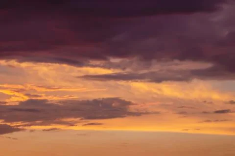 Dramatic sunset sky with clouds Stock Photos