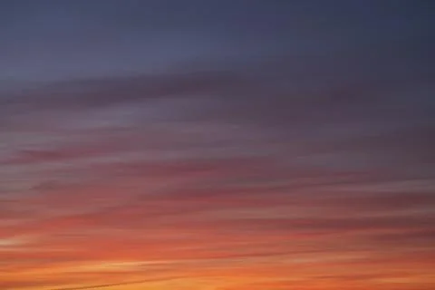 Dramatic sunset sky with clouds Stock Photos