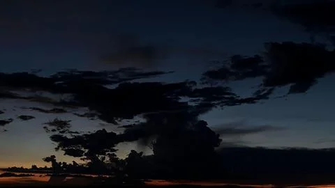 Dramatic sunset sky with clouds Stock Photos