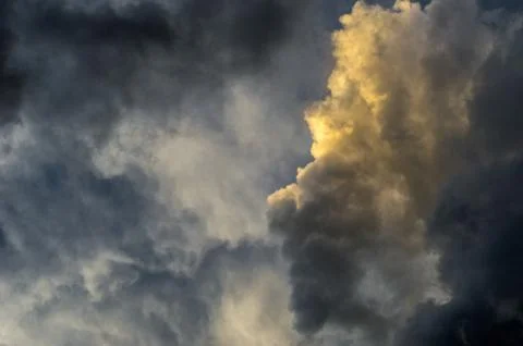 Dramatic sunset sky with colorful clouds after thunderstorm Stock Photos