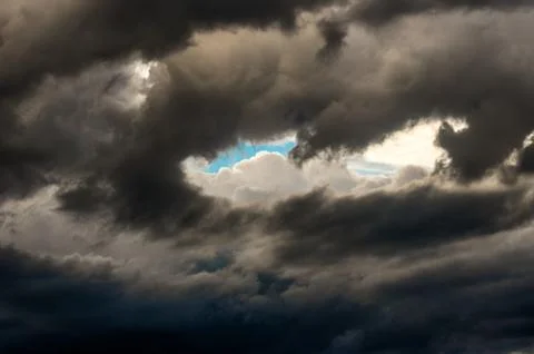 Dramatic sunset sky with colorful clouds after thunderstorm Stock Photos