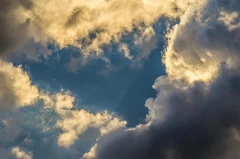 Dramatic sunset sky with colorful clouds after thunderstorm Stock Photos