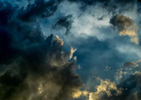 Dramatic sunset sky with colorful clouds after thunderstorm Stock Photos