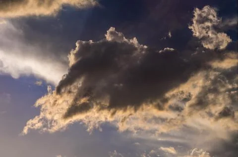 Dramatic sunset sky with colorful clouds after thunderstorm Stock Photos
