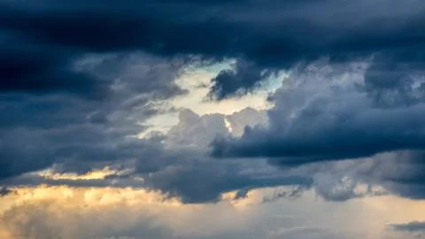 Dramatic sunset sky with colorful clouds after thunderstorm Stock Photos