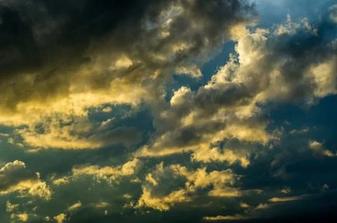 Dramatic sunset sky with colorful clouds after thunderstorm Stock Photos