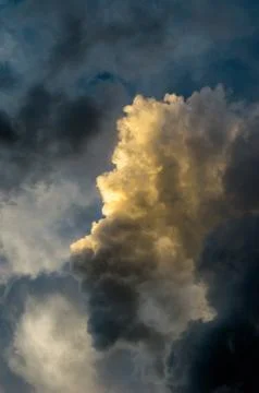 Dramatic sunset sky with colorful clouds after thunderstorm Stock Photos