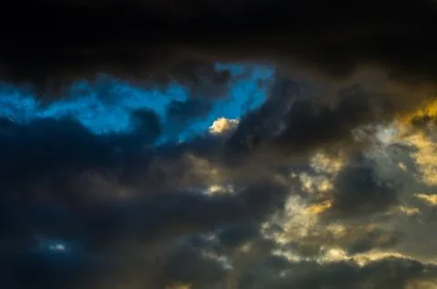 Dramatic sunset sky with colorful clouds after thunderstorm Stock Photos
