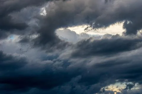 Dramatic sunset sky with colorful clouds after thunderstorm Stock Photos