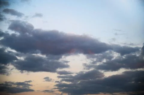 Dramatic Sunset Sky with Colorful Clouds Stock Photos