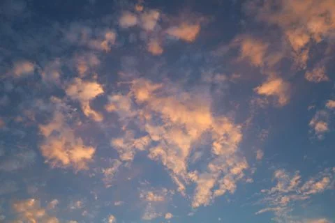 Dramatic sunset sky with colorful clouds at dusk. Nature background and tex.. Stock Photos