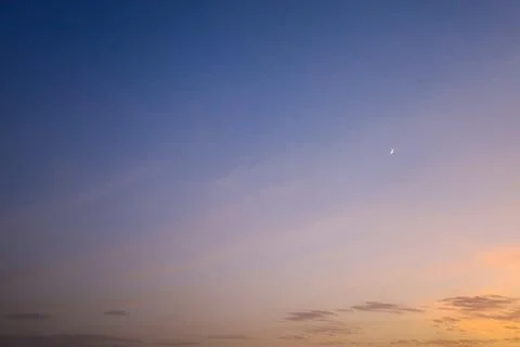 Dramatic sunset sky with colorful clouds at dusk. Nature background and tex.. Stock Photos