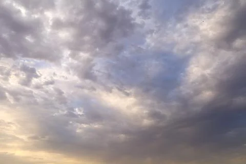 Dramatic sunset sky with colorful clouds at dusk. Nature background and tex.. Stock Photos