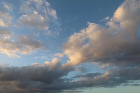 Dramatic sunset sky with colorful clouds at dusk. Nature background and tex.. Stock Photos