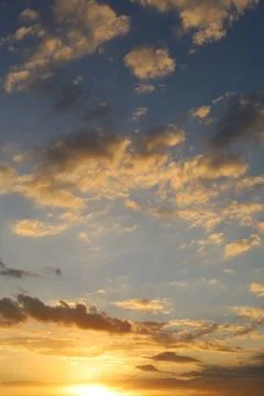 Dramatic sunset sky with colorful clouds at dusk. Nature background and tex.. Stock Photos