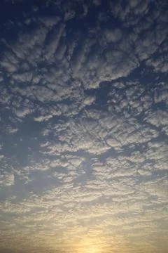 Dramatic sunset sky with colorful clouds at dusk. Nature background and tex.. Stock Photos