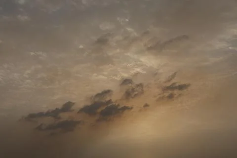 Dramatic sunset sky with colorful clouds at dusk. Nature background and tex.. Stock Photos