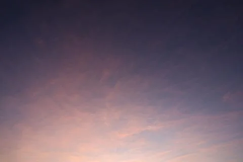 Dramatic sunset sky with colorful clouds at dusk. Nature background and tex.. Stock Photos