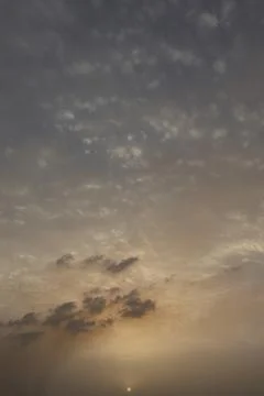 Dramatic sunset sky with colorful clouds at dusk. Nature background and tex.. Stock Photos