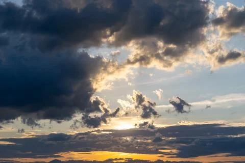 Dramatic Sunset Sky with Dark Clouds Stock Photos