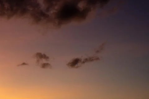 Dramatic Sunset Sky With Dark Clouds Stock Photos