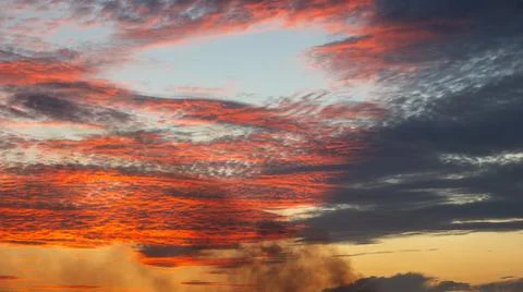 Dramatic Sunset Sky with Fiery Clouds Stock-Fotos