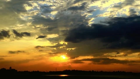 Dramatic Sunset Sky with Golden and Dark Clouds Stock-Footage 310816756