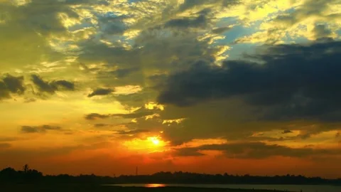 Dramatic Sunset Sky with Golden and Dark Clouds over Horizon Stock Footage 310817752