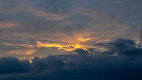 Dramatic Sunset Sky with Golden Clouds Stock Photos