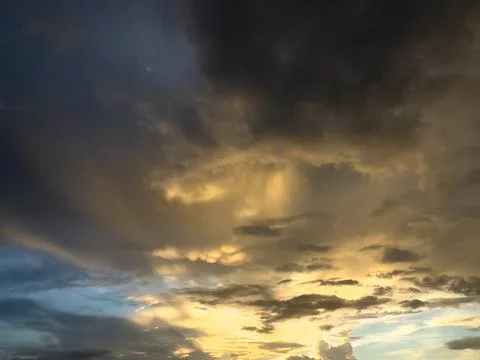 Dramatic Sunset Sky With Golden Clouds Stock Photos