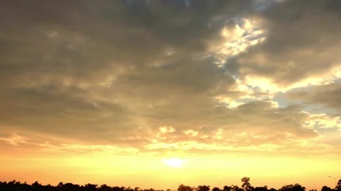 Dramatic Sunset Sky with Golden Hues and Cloud Formations Stock Footage 311587401