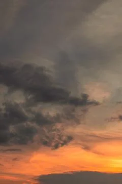 Dramatic Sunset Sky With Orange and Gray Clouds Stock Photos