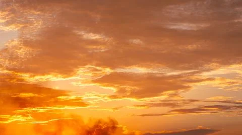 Dramatic Sunset Sky with Orange Clouds Stock Photos