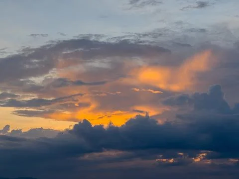 Dramatic Sunset Sky with Orange Clouds Stock Photos