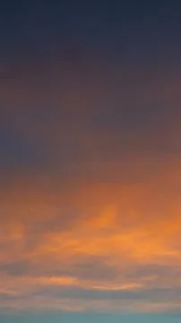 Dramatic Sunset Sky with Orange Clouds Stock Photos
