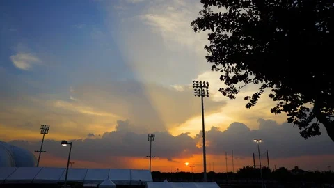 Dramatic sunset sky over American football stadium Stock Footage 105425157