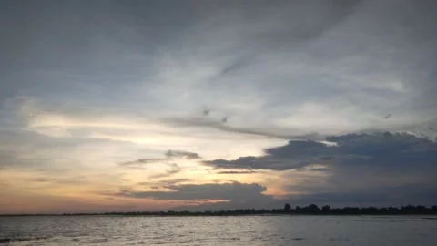 Dramatic Sunset Sky Over Calm Lake Water With Clouds During Dusk In Countrys Stock Footage 341361261