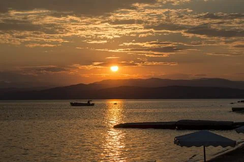 Dramatic sunset sky over the islands in the Aegean Sea, Greece. Stockfoto's