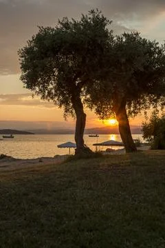 Dramatic sunset sky over the islands in the Aegean Sea, Greece. 写真素材