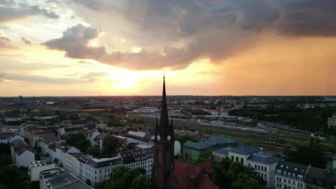 Dramatic Sunset Sky Over Leipzig, Germany Cityscape with a Church Spire Stock-Footage 331338998