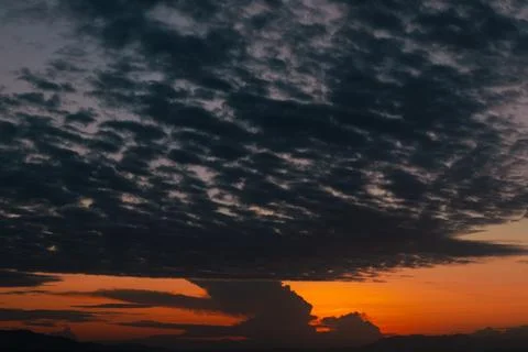 Dramatic Sunset Sky Over Mountain Horizon Stock Photos