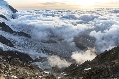 Dramatic sunset sky over the Rogues Alps. View from the Cosmique refuge, Ch.. Stock Photos