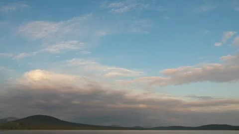 Dramatic Sunset Sky Over Southern Urals Landscape with Calm Water Video stock 325351004