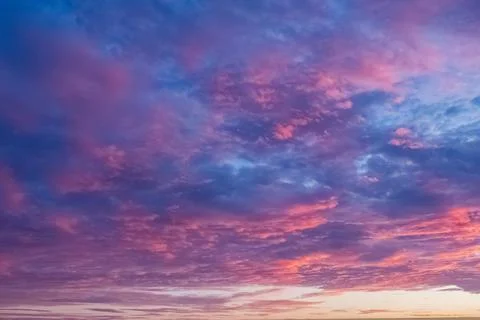 Dramatic sunset sky in red and blue colors Stock Photos