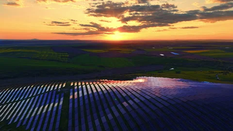 Dramatic sunset sky rises above solar panel farm, Bulgaria Stock Footage 345153051