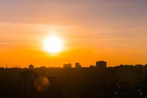 Dramatic sunset sky with the setting sun over the city, Istanbul Stock Photos